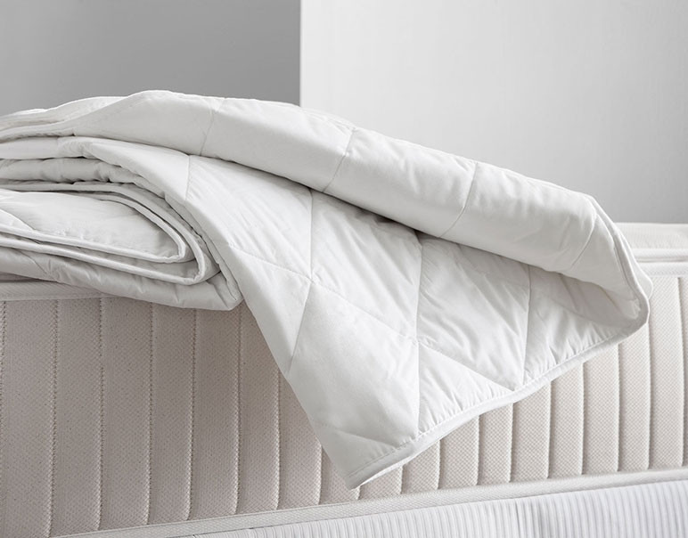 mattress pad with stretch sides